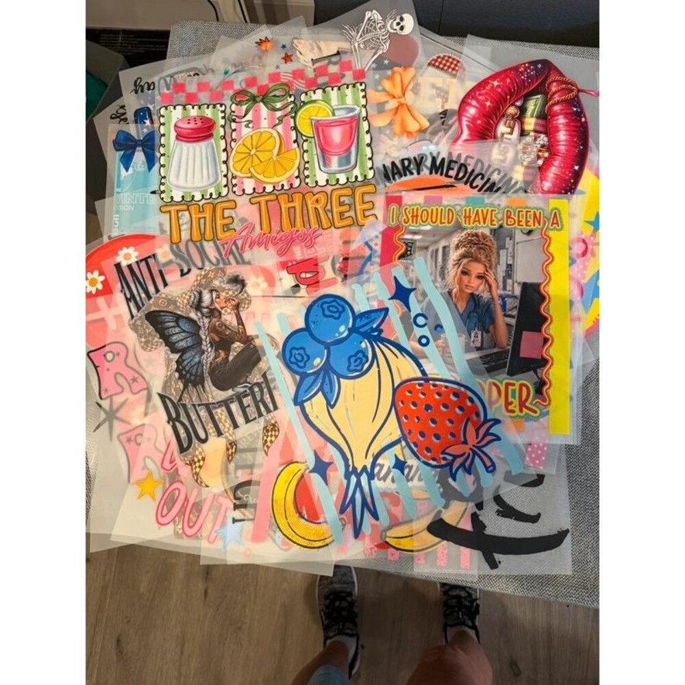 Mixed bundle of beach/summer t shirt heat press prints.